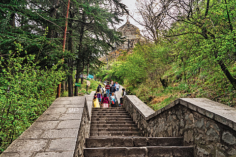 Tourists climb large steps to reach Shankaracharya temple, Srinagar