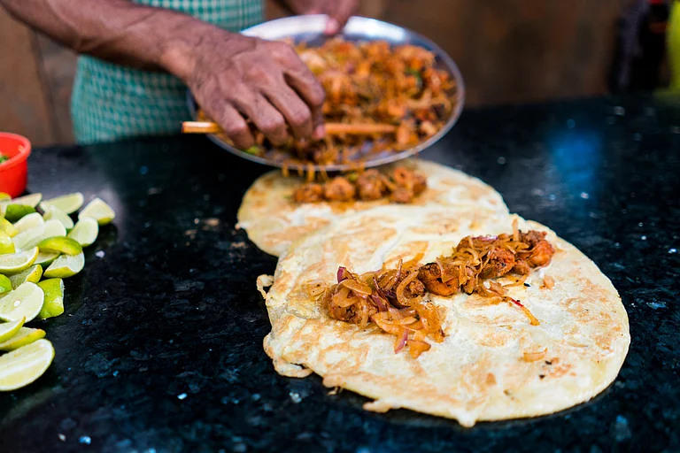 Kolkata kathi roll in the making - Shutterstock