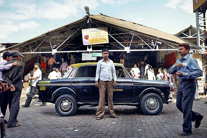 A kaali peeli in front of a station