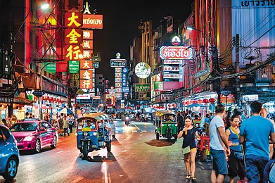 shutterstock : Enjoy a drink with friends at cocktail bars and night clubs along these bustling streets in Bangkok.
