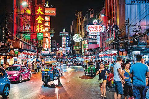 Enjoy a drink with friends at cocktail bars and night clubs along bustling streets in Bangkok