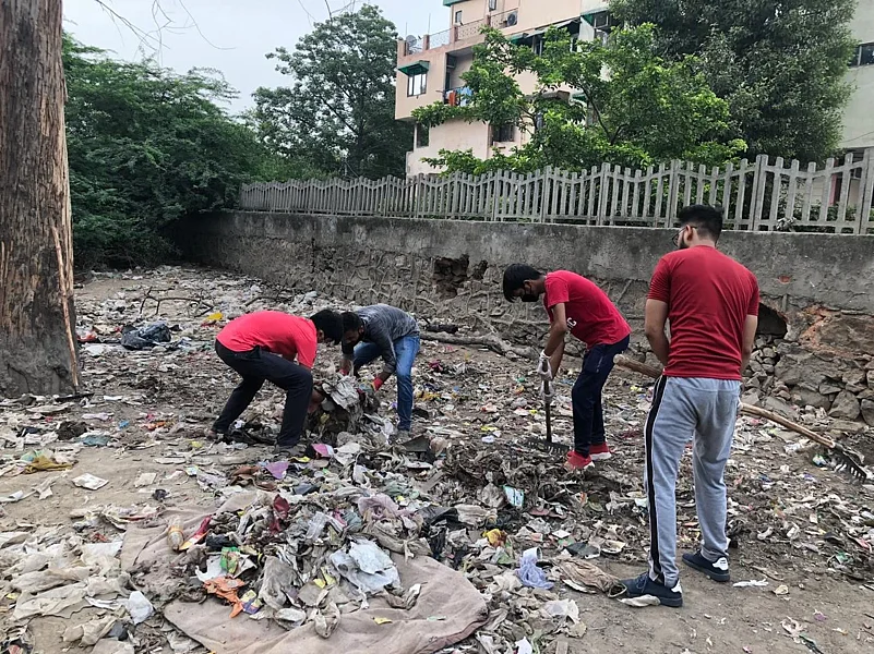 NGO volunteers collecting waste