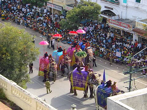 The procession moves through the city