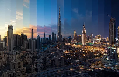Shutterstock : Day to night transition montage from the skyline Dubai Downtown