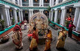 A puja at a bonedi bari