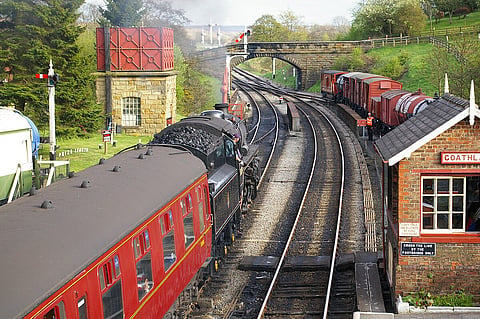 A steam train at the station