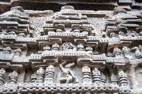 The pillars and walls have detailed carvings