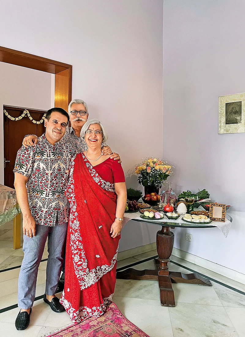 Lilaowala poses with his parents on Navroz