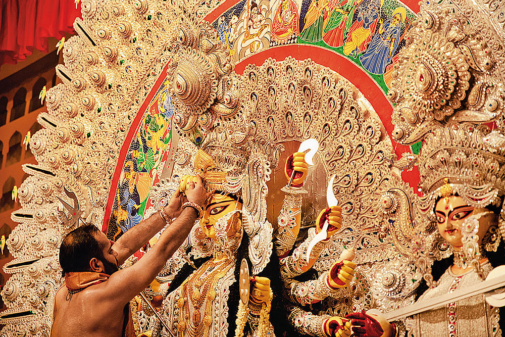 Banerjee performing a pujo ritual