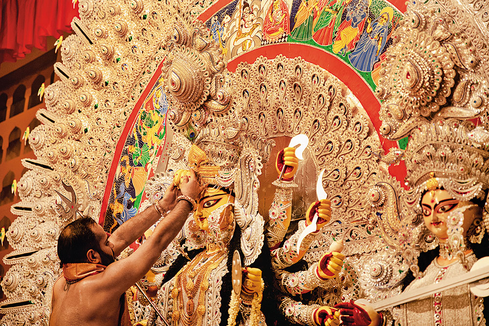 Banerjee performing a pujo ritual