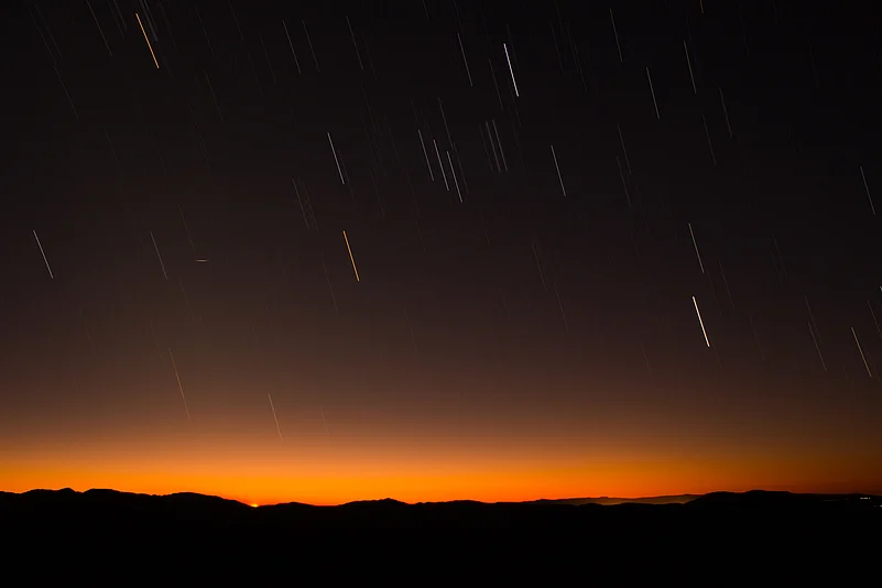 A meteor shower in the mountains