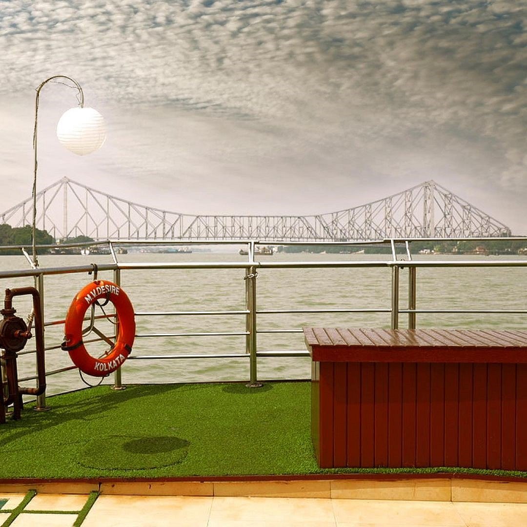 @thebargecompany/Instagram : Enjoy stunning views of the Howrah Bridge from the deck