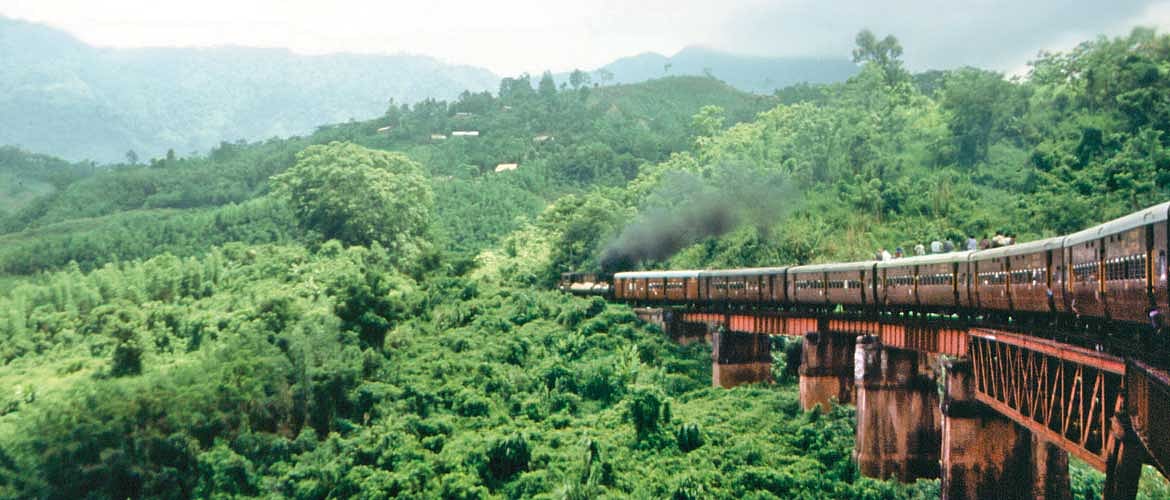 Swapan Nayak/Outlook Traveller : Train going past thickly wooded hills in Haflong