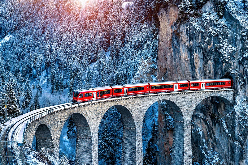 The Glacier Express against an eerie mountain
