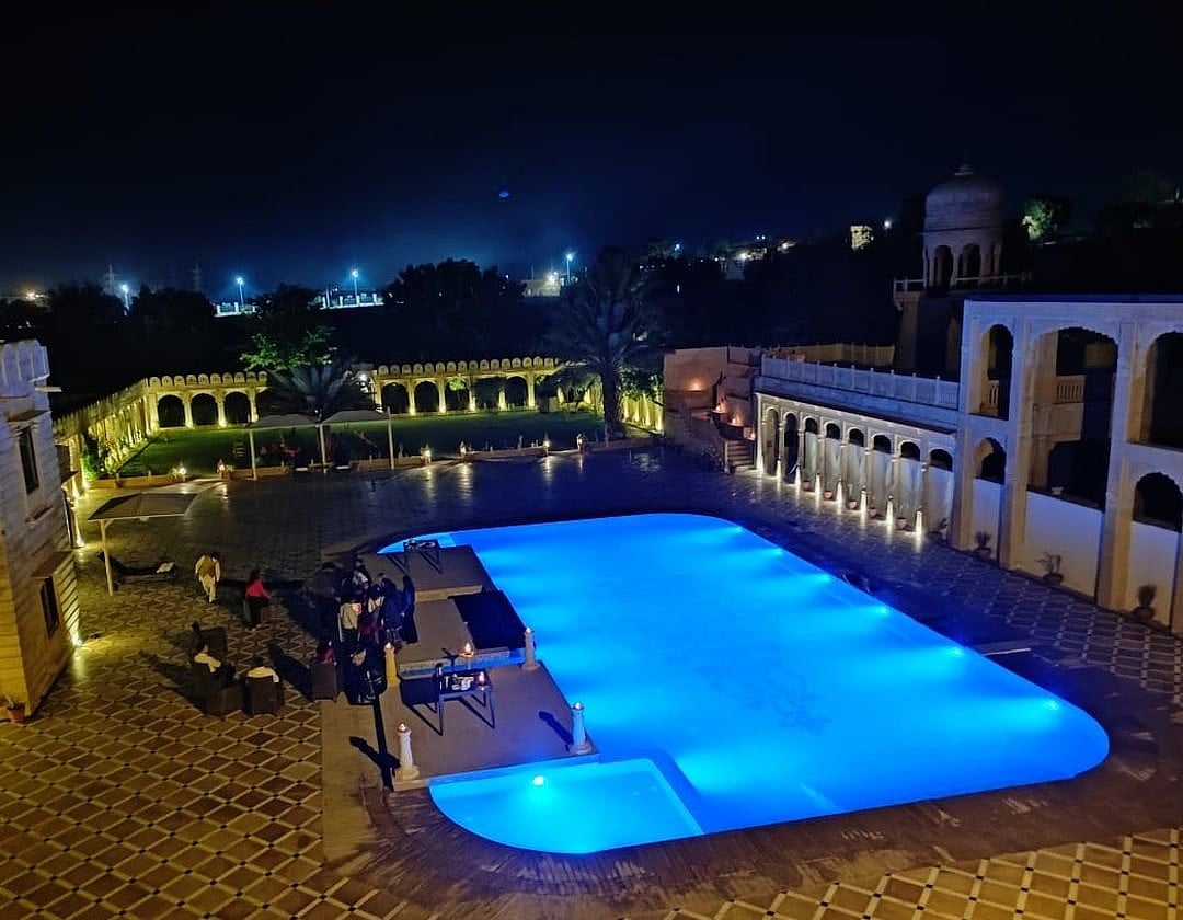 Enjoy a poolside barbeque at Fort Rajwada
