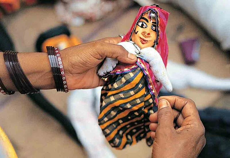Traditional Rajasthani cloth puppets are popular souvenirs among tourists