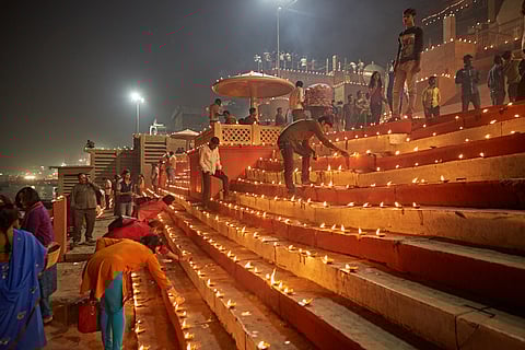 Varanasi Ghats being lit up by diyas