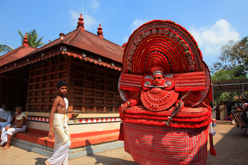 A theyyam artist performs at Kadannappalli Muchilot Bhagavati temple in Kannur