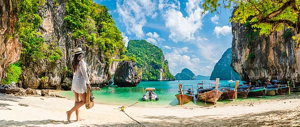 Shutterstock : A woman vacationing on a beach