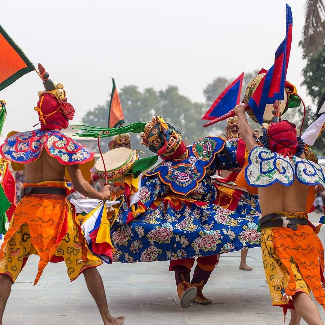 Masked dancers performing at the festival