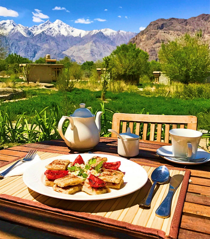 The grounds of Lchang Nang Retreat in Ladakhs Nubra have outdoor tea stations and the small hotel arranges for picnics by the river nearby