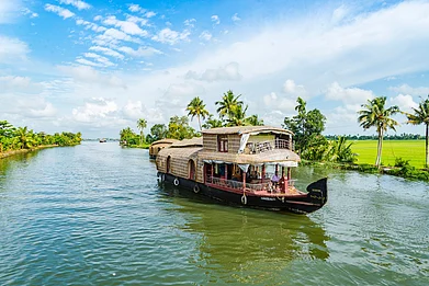 Abhishek Prasad on Unsplash : A houseboat sailing through the backwaters of Alleppey