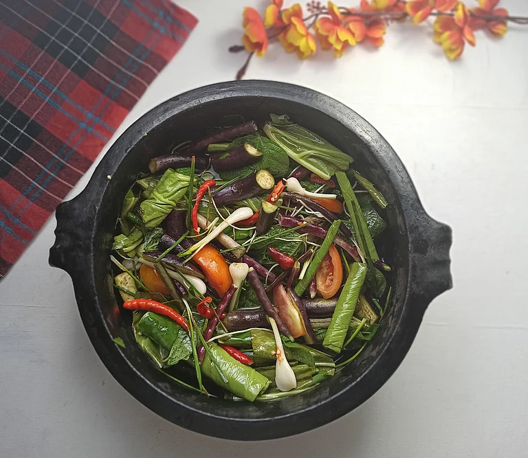 Rosep Aon Ao, a dish made of mixed vegetables, dry fish and bamboo shoots - Shutterstock