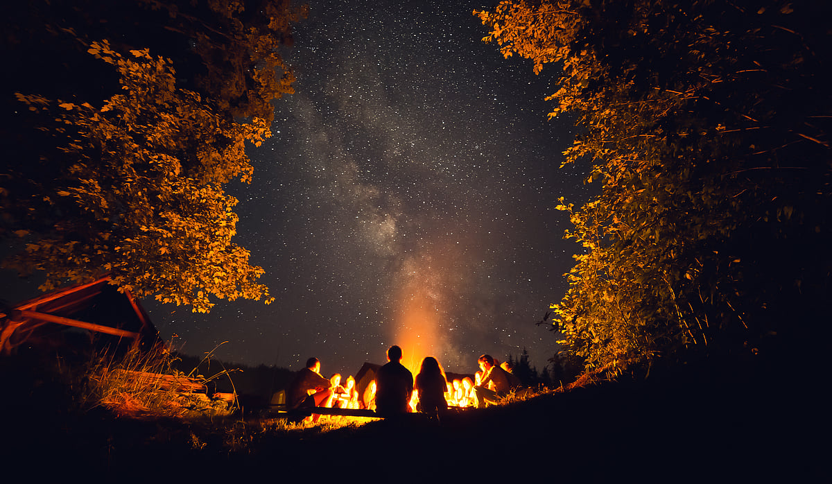 People camping at night