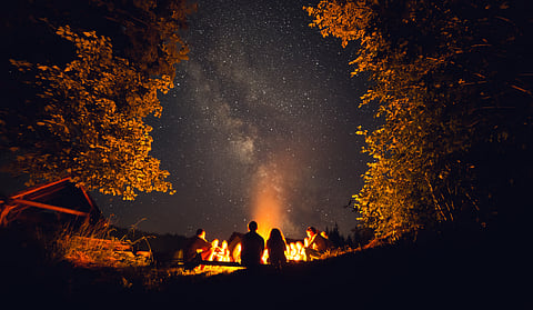 People camping at night
