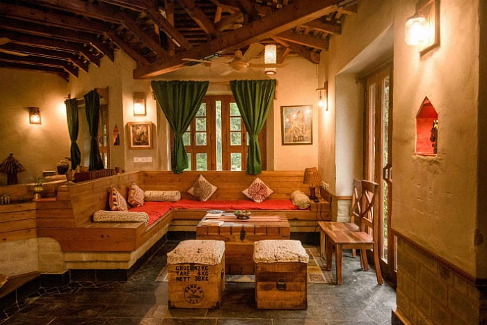 The buildings at The Lodge at Wah, in Kangra in Himachal Pradesh, are made of eco-friendly local materials like wood, slate and mud. Much of the wood used is reclaimed and was acquired when the Old Palampur Courthouse was being demolished. The river stone and slate is hand-chiseled and the bricks were made of mud excavated when the foundation was being built.