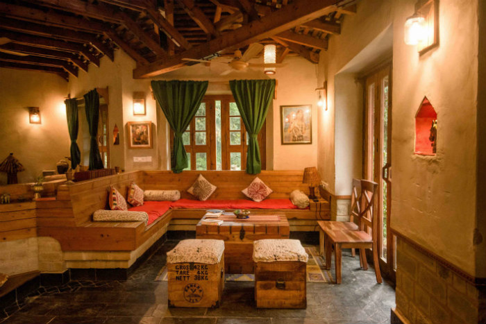 The buildings at The Lodge at Wah, in Kangra in Himachal Pradesh, are made of eco-friendly local materials like wood, slate and mud. Much of the wood used is reclaimed and was acquired when the Old Palampur Courthouse was being demolished. The river stone and slate is hand-chiseled and the bricks were made of mud excavated when the foundation was being built.