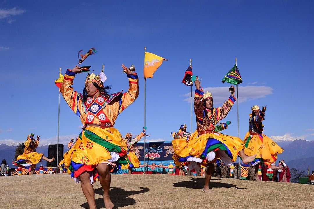 Old men and women performing the traditional dance