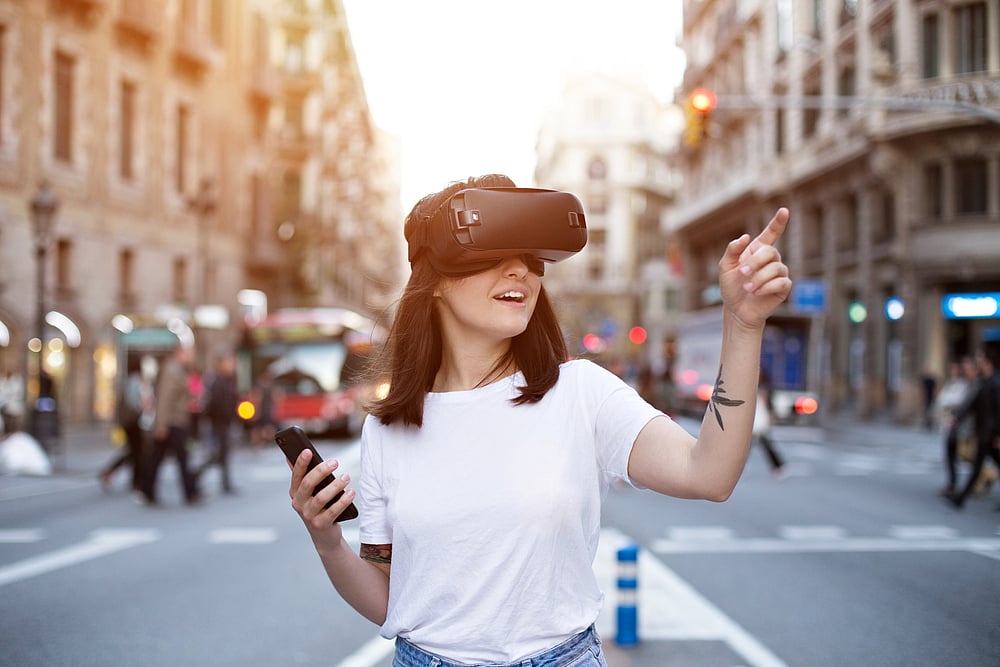 A female traveller uses a VR headset while travelling