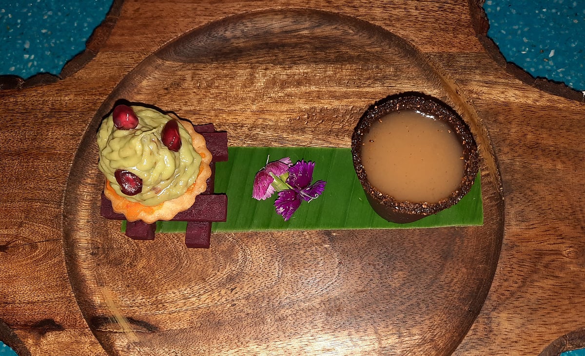Amuse bouche - twist of guacamole and papdi bruschetta with chilled guava shots