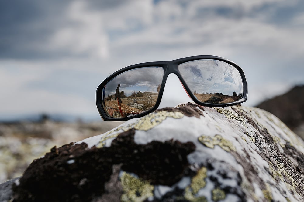 During your winter trek,  steer clear of sunglasses with side apertures and go for wraparound styles instead