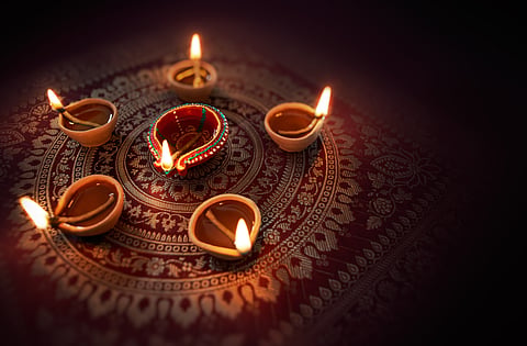 Pick up diyas for Diwali