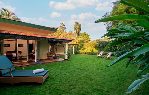 Greenery envelops the suites at Soukya