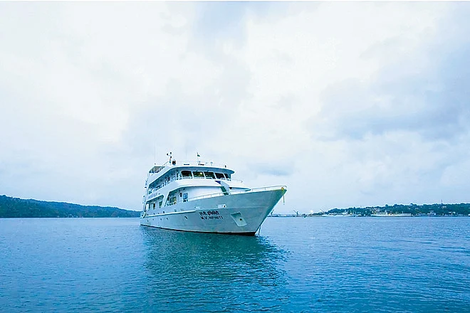 Infiniti Live-Abroad, a large four-decked ship, takes guests around the Andamans pristine island