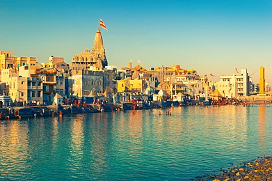 Shutterstock : View of Gomti Ghat and Hindu Temple Shree Dwarkadhish, Dwarka