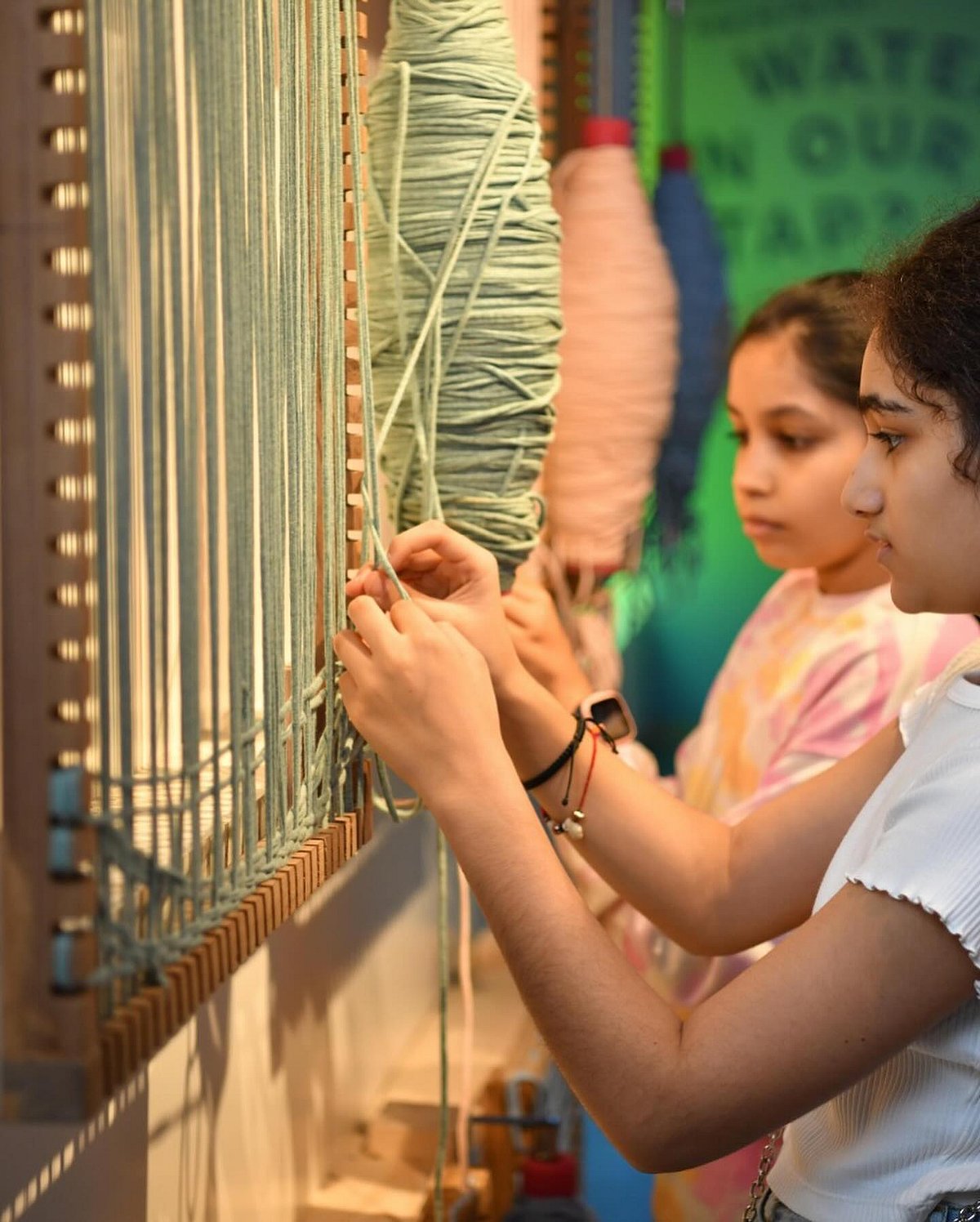 Children experimenting with different materials and tools