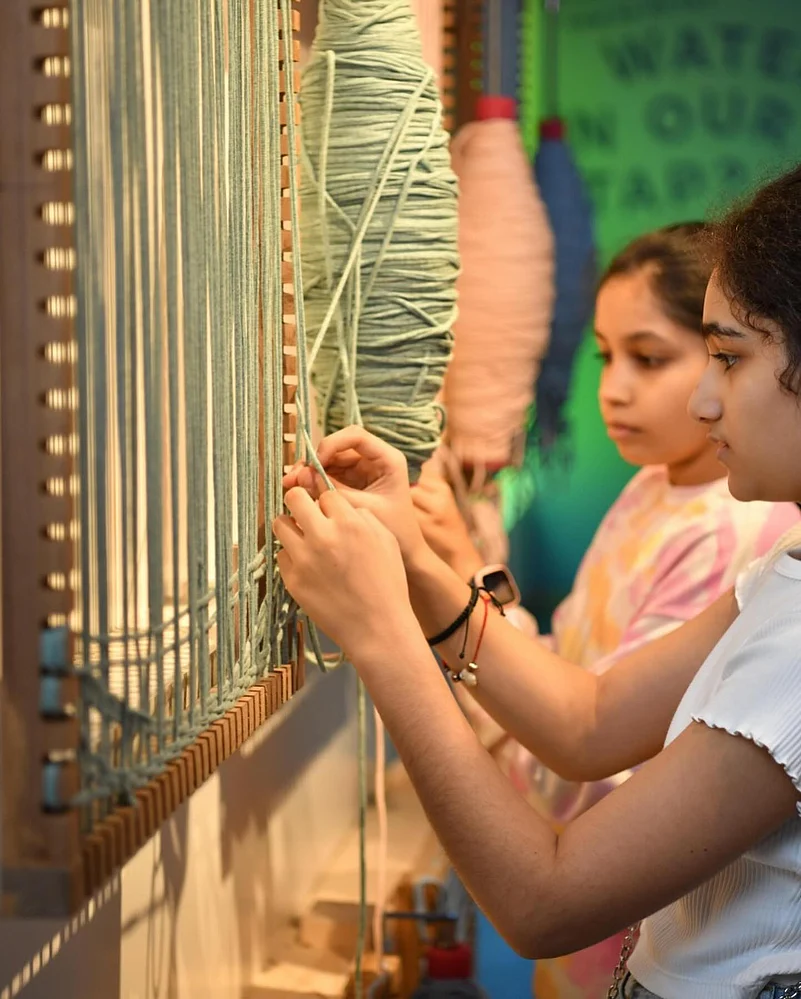 Children experimenting with different materials and tools