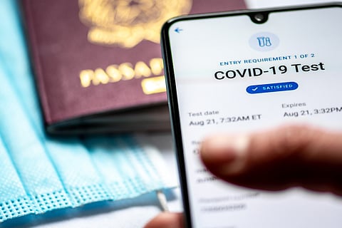 It is advised to get a COVID-19 test if you experience symptoms while travelling