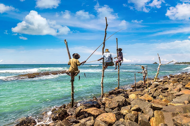 Local Fisherman fishing in Weligama