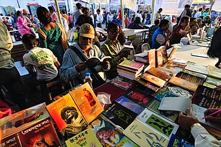 Rudra Narayan Mitra/Shutterstock : People browse books at the Boi Mela in Kolkata