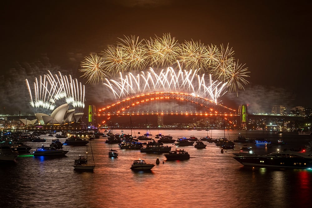 Sydney NYE fireworks over the harbour and bridge