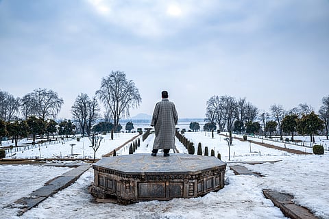 The snow-covered Nishat Bagh Mughal garden during winter in Srinagar, J&K.