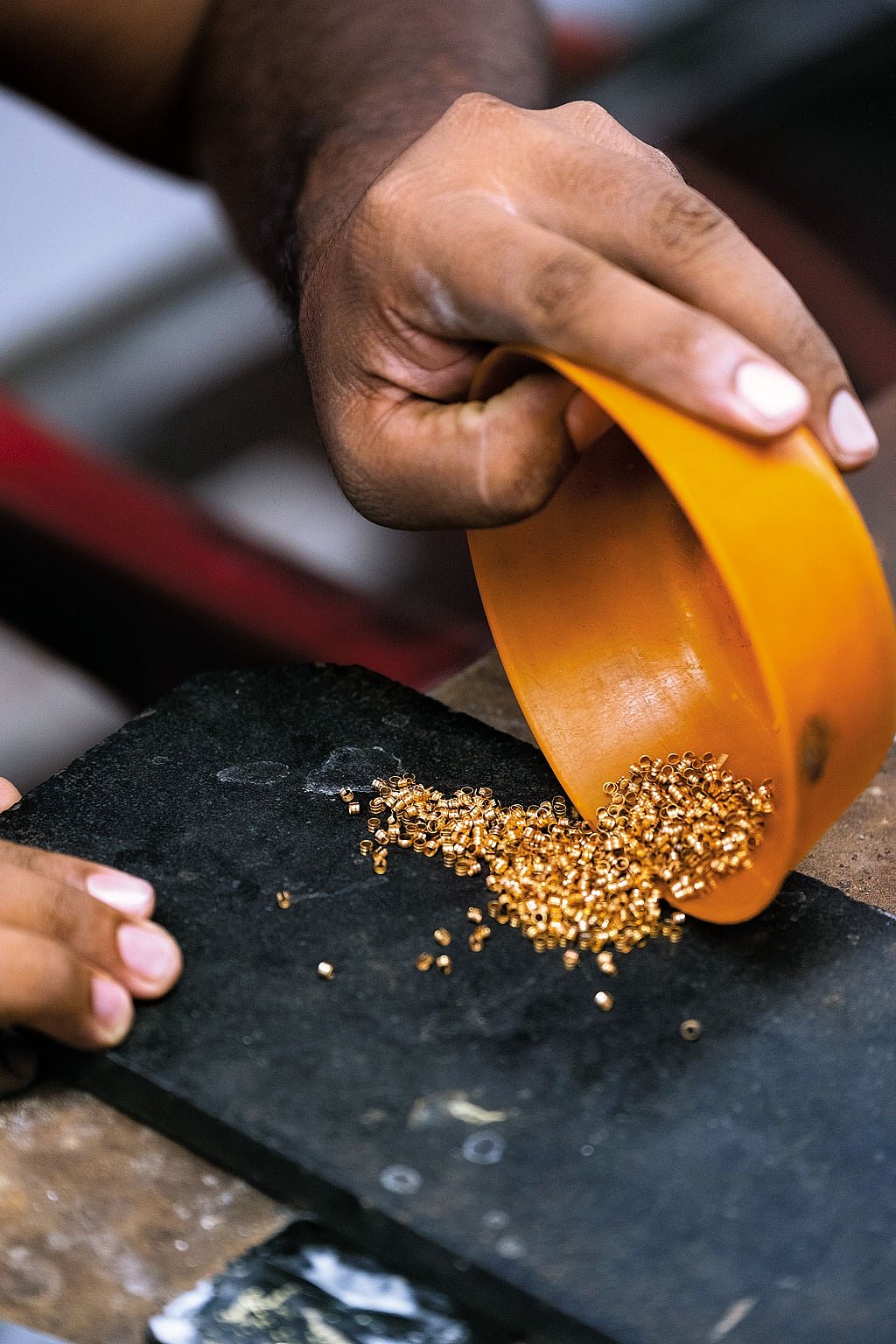 A jeweller at his gold workshop - null