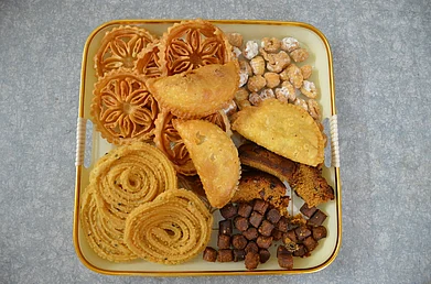 DS Lucas/Shutterstock : A platter of Christmas treats, or kuswar