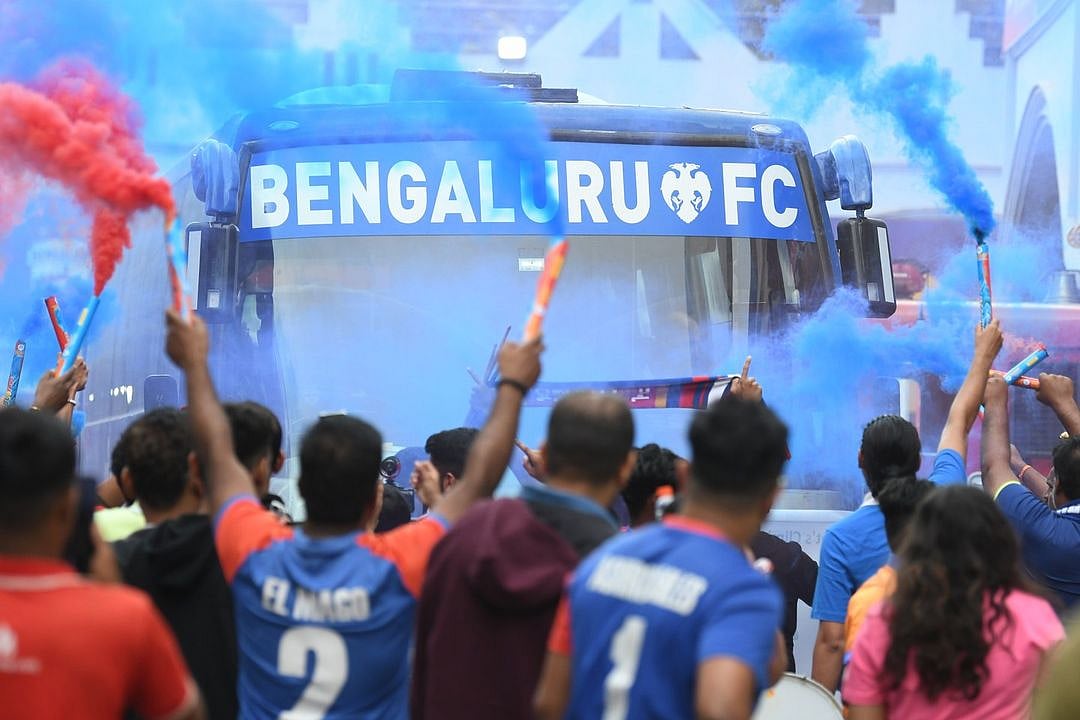 Bengaluru FC arriving for a match amid fans