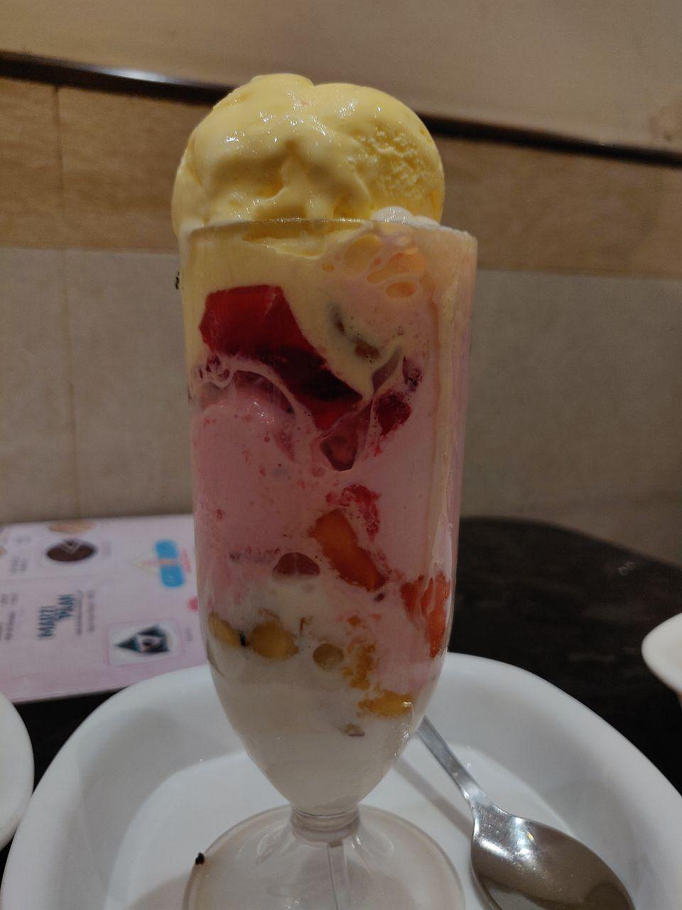 Gadbad ice cream is a vertical sundae with a little bit of eveything
